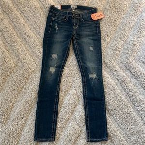 Distressed skinny jeans